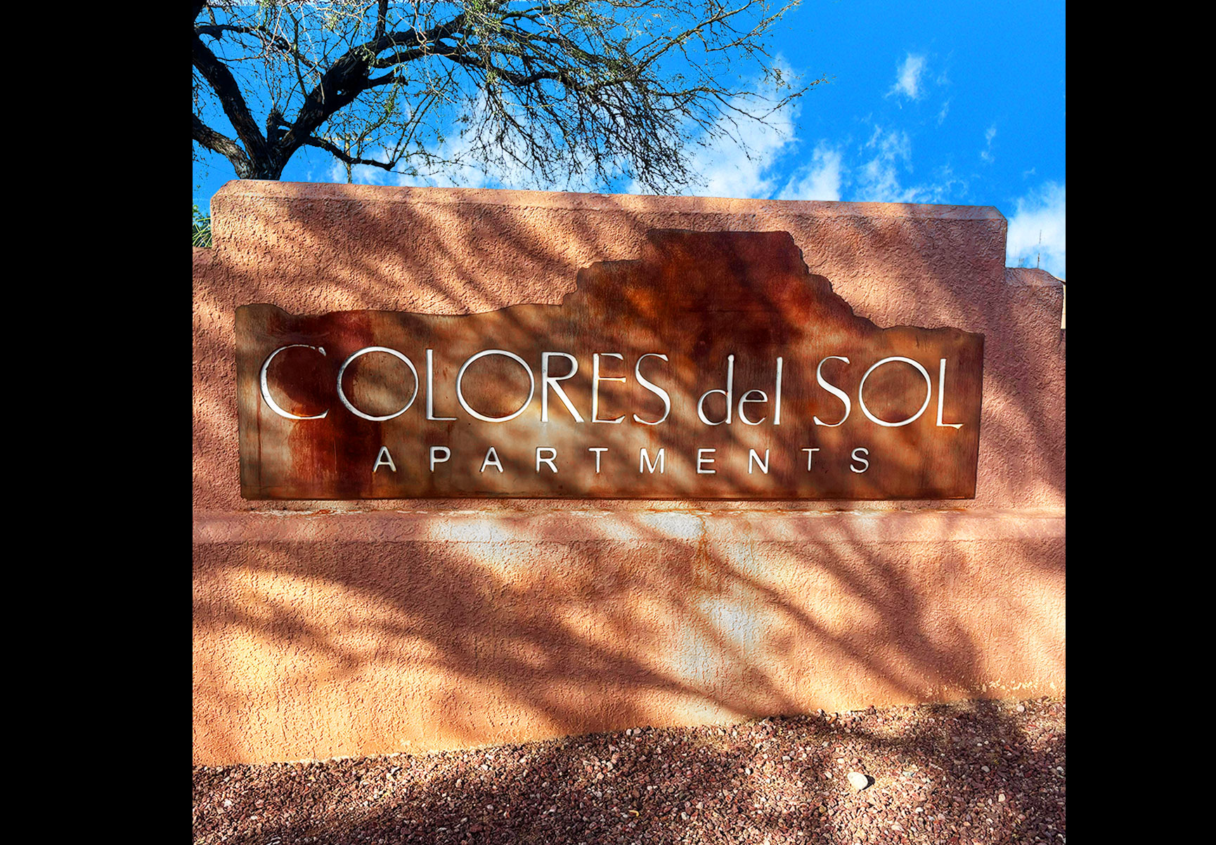 This image displays entrance marker photo of Colores Del Sol Apartments