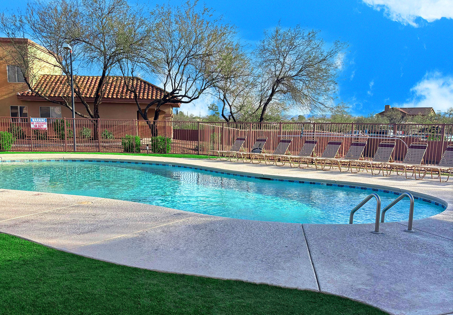 This image displays swimming pool photo of Colores Del Sol Apartments